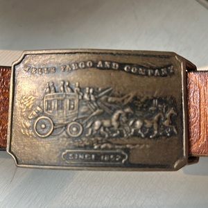 Vintage leather belt with Wells Fargo stage coach buckle